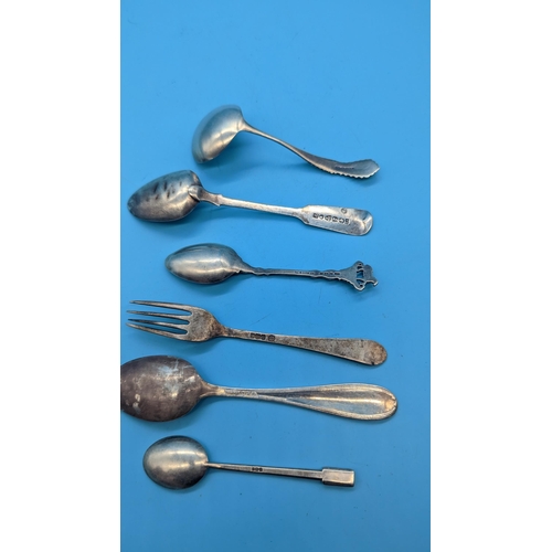 497 - An Assortment of Hallmarked Silver Spoons and Fork 97 grams