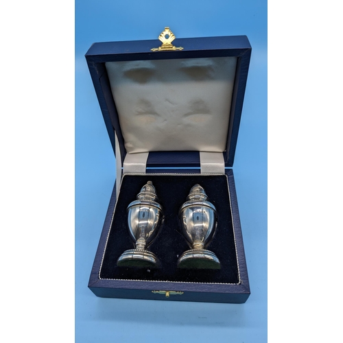 490 - A Cased Set of Hallmarked Silver Salt and Pepper Pots 75Grams