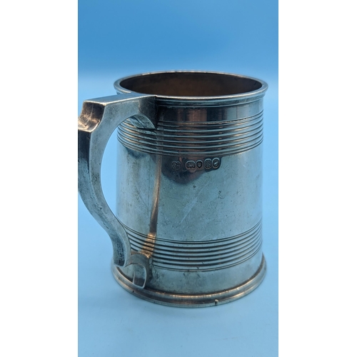 495 - A Hallmarked Silver Tankard 