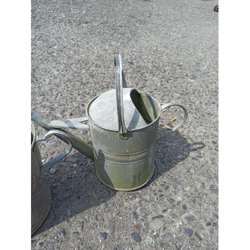 79 - A Pair of Metal Garden Watering Cans 43cm H