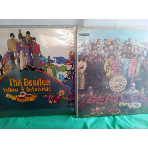 719 - Beatles LP,  Singles inc. Yellow Submarine, Sgt Peppers, Please Please, For Sale and More