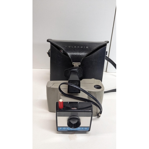 799 - A Polaroid Swinger II Land Camera