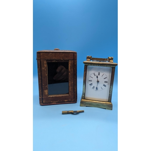 494 - A 19th Century Victorian Brass Chiming Carriage Clock in Leather Case - with Key, 15cm High in Case