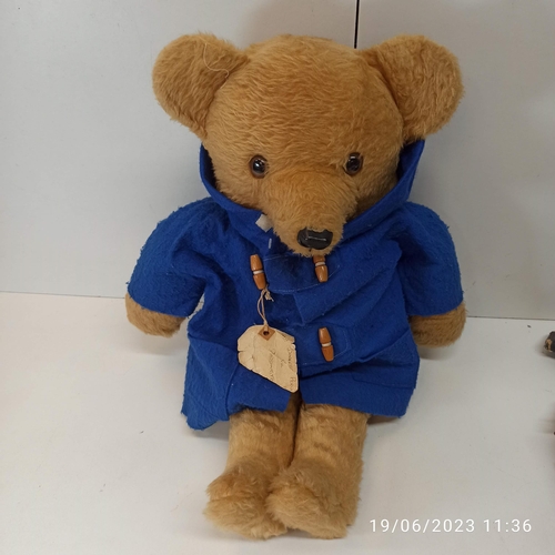 836 - A Paddington Bear Cuddly Toy In Blue Coat. No hat. 64cm H Approx.