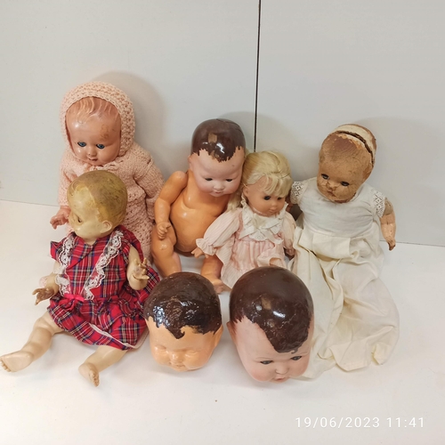 837 - An Assortment Of Antique And Vintage Dolls And Dolls Parts. Various Compositions.