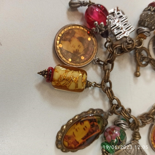 742 - A Chinese Themed Charm Bracelet, made by 