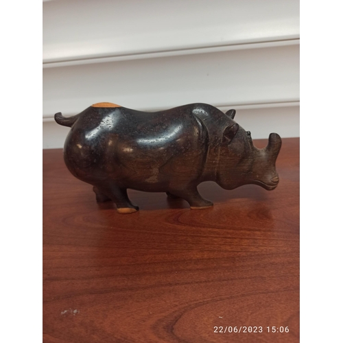 1244 - A Carved Wooden Hippo and Rhino