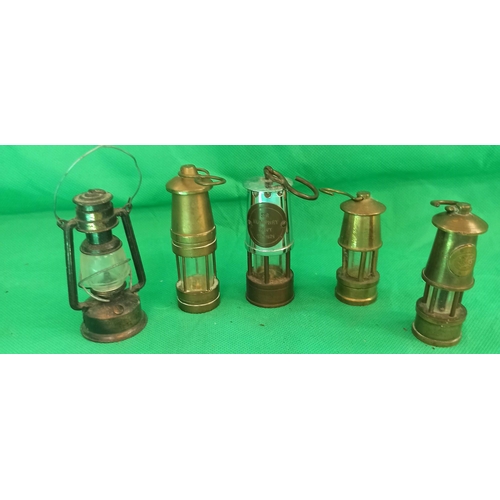 1298 - A Selection of Miniature Davey Miners lamps