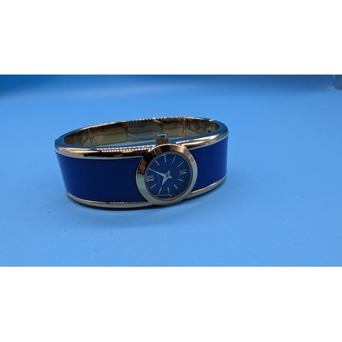 524 - A Ladies Caravelle of New York Blue Enamel Watch - Boxed (second hand requires re-setting)