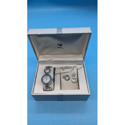 535 - An EWM Watch/ Earring Gift Set