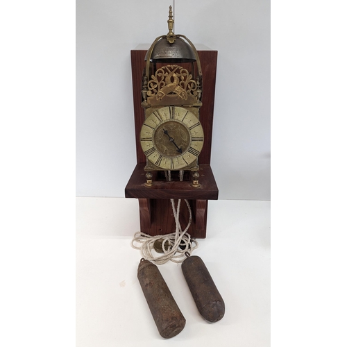 499 - A Brass Lantern Clock with 6