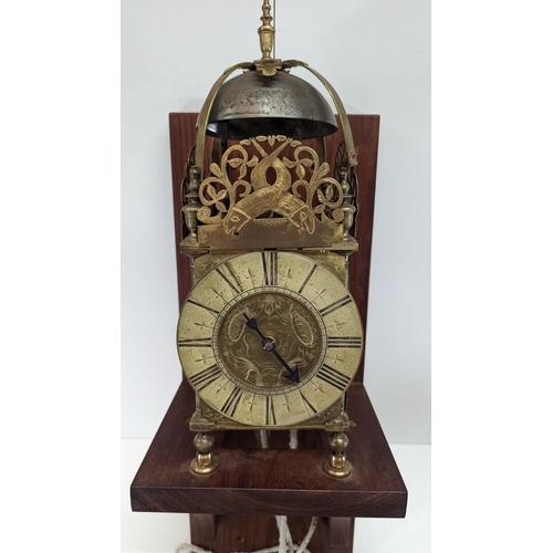 499 - A Brass Lantern Clock with 6