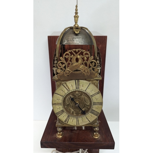 499 - A Brass Lantern Clock with 6