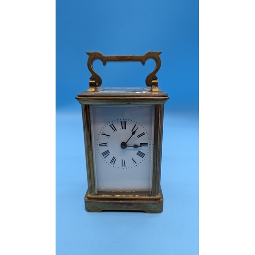 492 - A Brass Carriage Clock - Running with Key 11.5 cm High