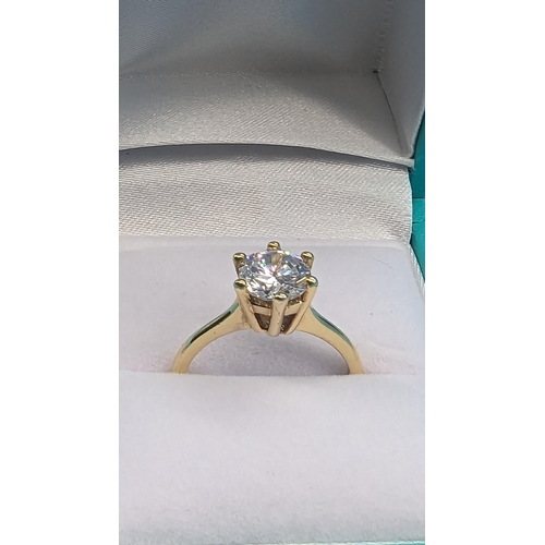 414 - A 9ct White Stone Solitaire Ring