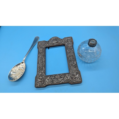 466 - A .925 Silver Picture Frame and Bulbous Crystal Bottle ( no stopper/ top)