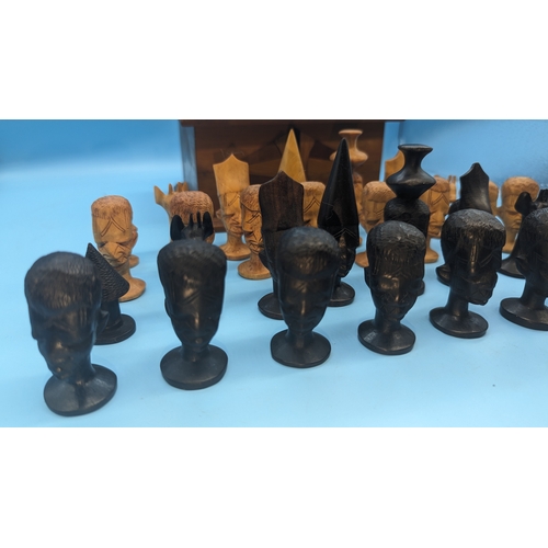 855 - Carved  African Head Chess Pieces in Puzzleware Wooden Box