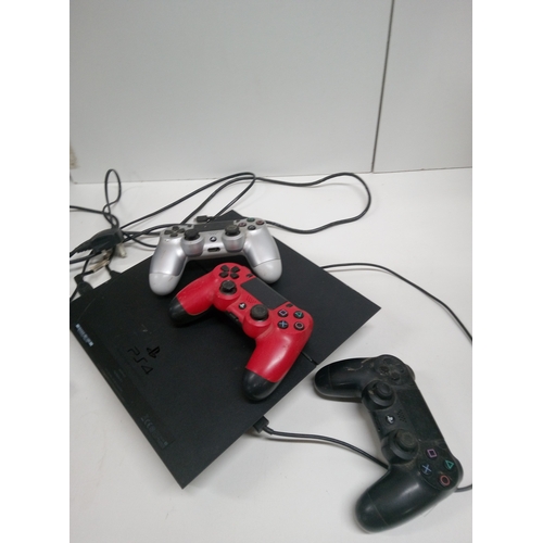 829H - A Playstation 4 with 3 x Controllers