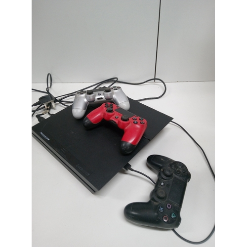 829H - A Playstation 4 with 3 x Controllers