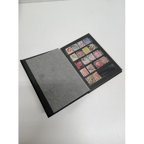 668B - A Small Stamp Album of Victorian and Georgian Stamps