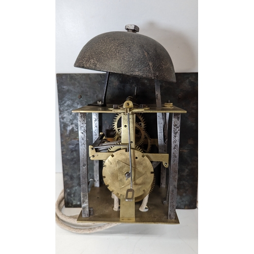 497 - A Square Faced Lantern Clock having a 10 x 10