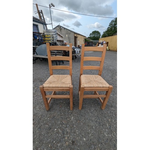 684 - 2 x Rush Seated Pine Chairs