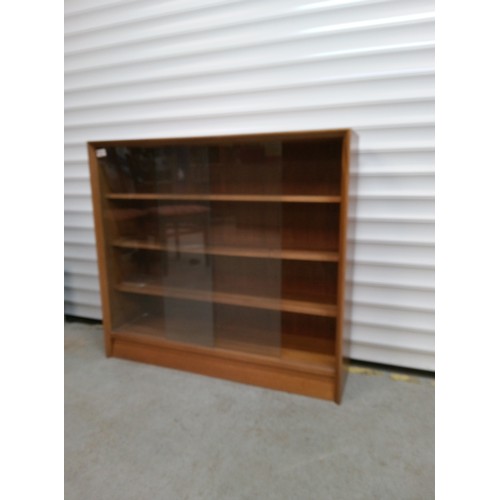 692 - Mid Century Bookcase with Glass Sliding Doors and Adjustable Shelves 84cm H x 91cm W, x 24cm D