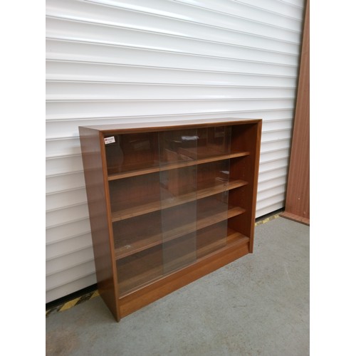 692 - Mid Century Bookcase with Glass Sliding Doors and Adjustable Shelves 84cm H x 91cm W, x 24cm D