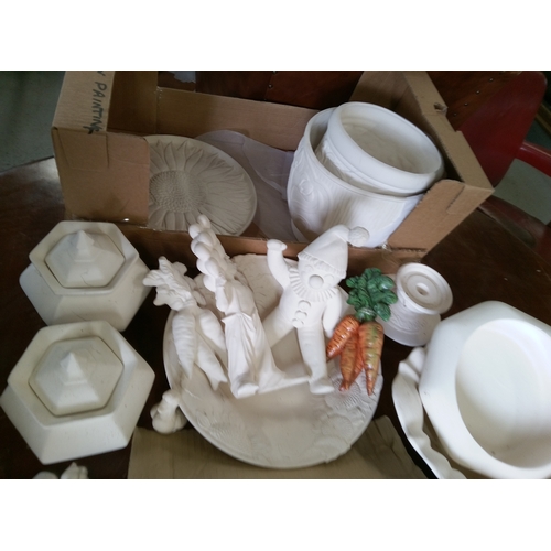 110 - A Quantity of Unpainted  Bisque Pottery Items, Paints etc.