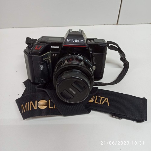 797B - A Minolta SLR Camera with Lens and Accessories