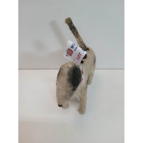 815A - Small Vintage Clockwork Dog with wagging tail