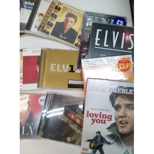 739B - A Box of Elvis Memorabilia DVD's CD's, Books, Plates and Pictures