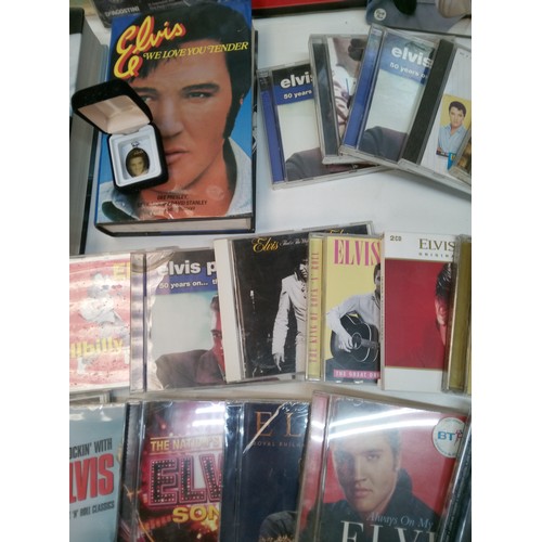 739B - A Box of Elvis Memorabilia DVD's CD's, Books, Plates and Pictures