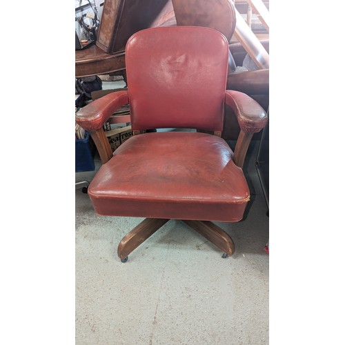 706 - A Vintage Red Leather Office , Swivel Armchair