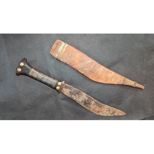 1632 - An African Jile Knife with Wooden Wire Bound Handle and Stitched Leather Sheath. 15cm Blade.