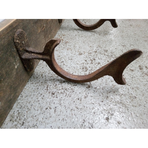 824 - 3 Antique Hooks on a Wooden Board