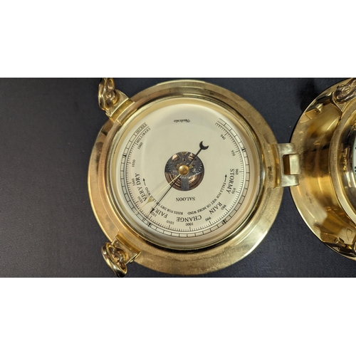 835 - A Nauticalia Brass Ships Clock and Barometer. 23cm Diameter.