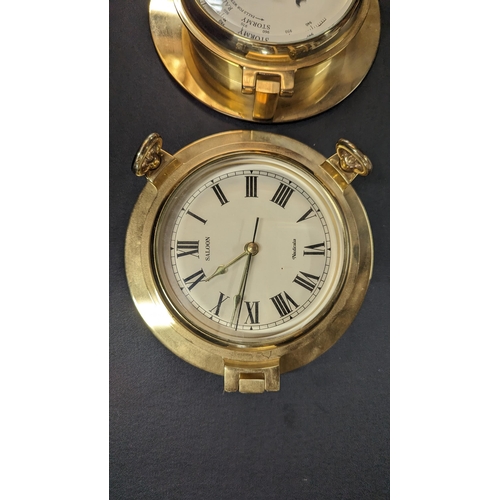 835 - A Nauticalia Brass Ships Clock and Barometer. 23cm Diameter.