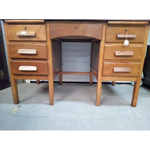 960 - A Vintage Pine Desk with 7 Drawers and Keys.