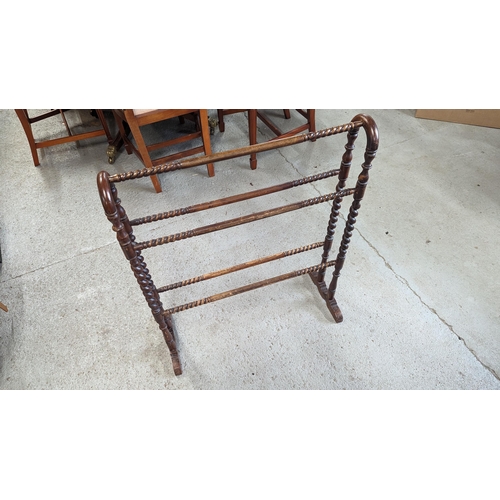 831 - An Antique Wooden Towel Rail.