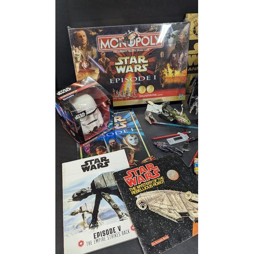 1466 - An Assortment of Star Wars Collectables including Sealed Monopoly, Toys and Stickers etc