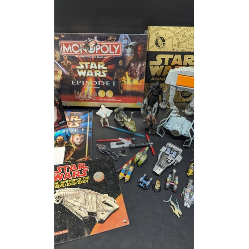 1466 - An Assortment of Star Wars Collectables including Sealed Monopoly, Toys and Stickers etc