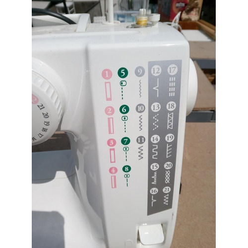 652 - Toyota Sewing Machine with Power Lead and Pedal. Model FSS21RS.