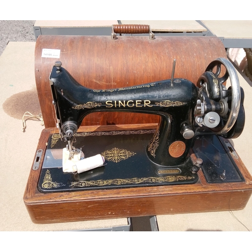 651 - Singer Sewing Machine In Wooden Case with Key.