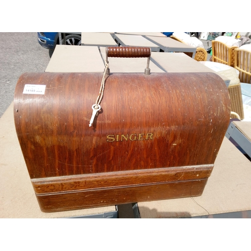 651 - Singer Sewing Machine In Wooden Case with Key.