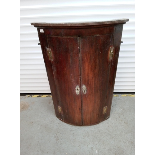 951 - Dark Hardwood Wall Hanging Bow Fronted Cabinet with Key. 
112cm H x 45 cm x 45 cm