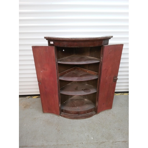 951 - Dark Hardwood Wall Hanging Bow Fronted Cabinet with Key. 
112cm H x 45 cm x 45 cm