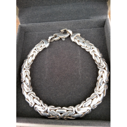 805 - A Heavy Silver Bracelet.