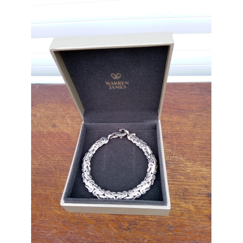 805 - A Heavy Silver Bracelet.