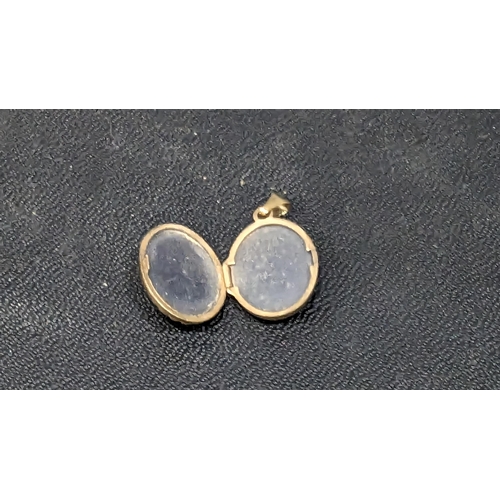 771 - A 9ct Gold Pendant Locket. 1.2gms